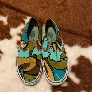 Vans floral print slip ons.